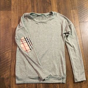 Green tunic sweater.